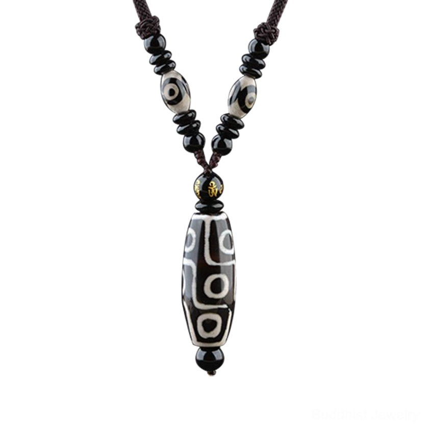 Complete nine-eye dzi bead necklace full-length view showing entire Buddhist amulet pendant and woven strap