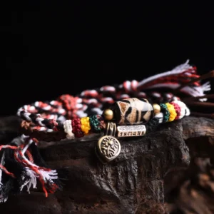 Nine-eye dzi bead Om Mani Padme Hum copper adjustable Buddhist prayer bracelet with multicolor woven rope and metal pendants