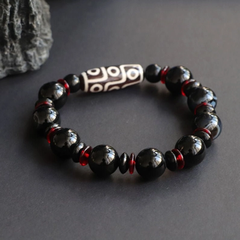 Nine-Eye Dzi Bead Bracelet overhead view showing bead pattern and spacing