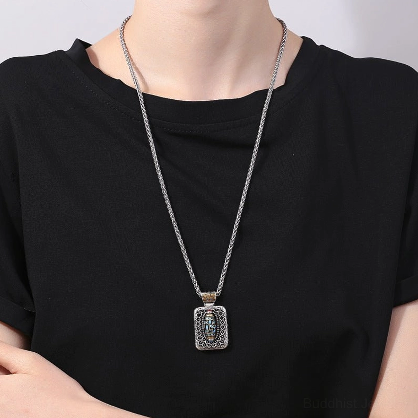 Nine-Eye Dzi Bead necklace pendant worn on model daily wear style minimal layering spiritual Buddhist jewelry