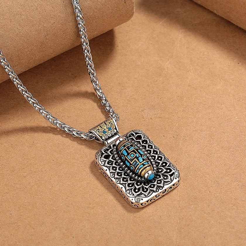 Nine-Eye Dzi Bead rotatable pendant necklace side angle view showcasing 360-degree rotating central bead mechanism and copper craftsmanship