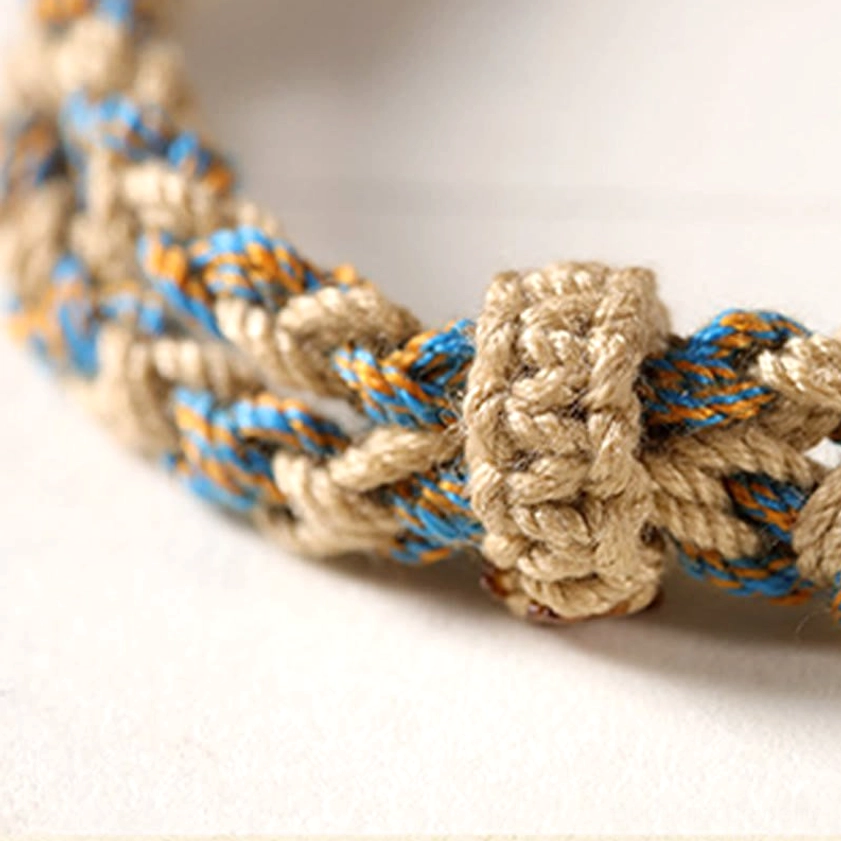 Nine-eye dzi bead prayer bracelet for prosperity and protection on neutral background
