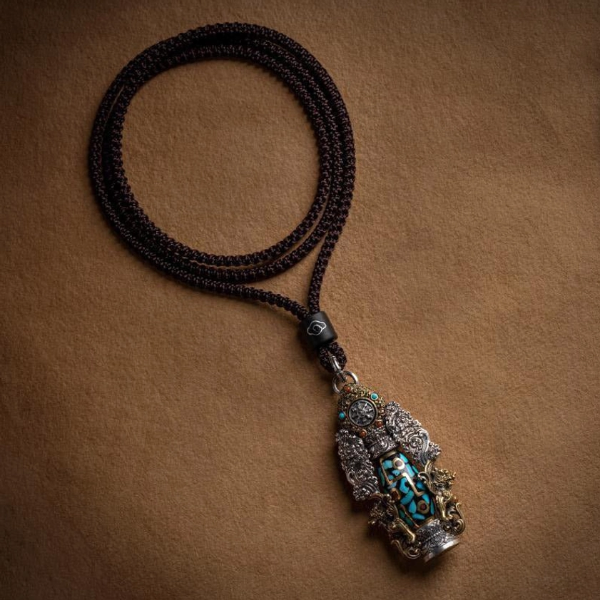 Nine-eye dzi turquoise buddha necklace showing authentic natural material variations, confirming genuine handmade spiritual craftsmanship quality