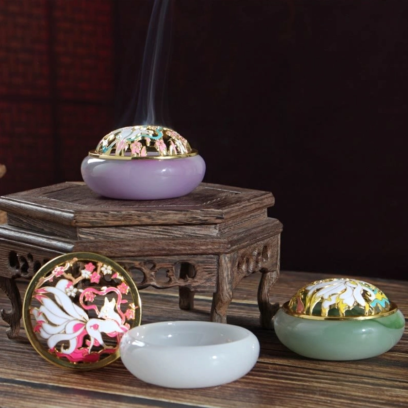 Nine-tailed fox liuli crystal incense burner set displayed overhead with assembled and disassembled pieces, showing lavender and jade green jade-style bases with gold-trimmed cloisonne lids and rising incense smoke