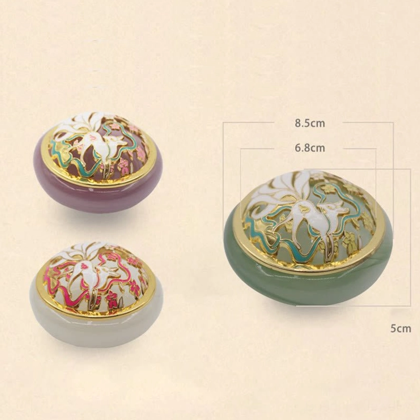 Comparison of three nine-tailed fox incense burners in different jade-style colors demonstrating artisanal handcrafted quality and color variations
