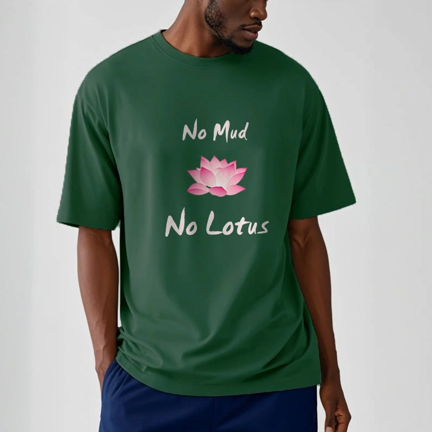 Man wearing No Mud No Lotus Buddhist t-shirt in dark green with pink lotus and text print