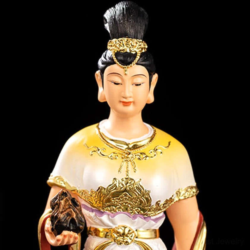 Nuwa Bodhisattva upper body close-up showing golden hair ornament and intricate chest embroidery