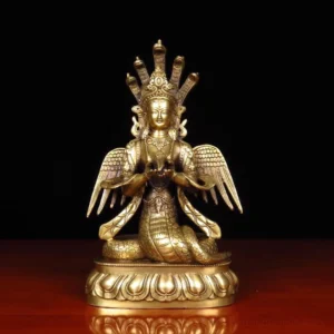 Nuwa Buddha copper statue front view with winged torso and serpent coiled lower body on lotus petal base, antique brass finish