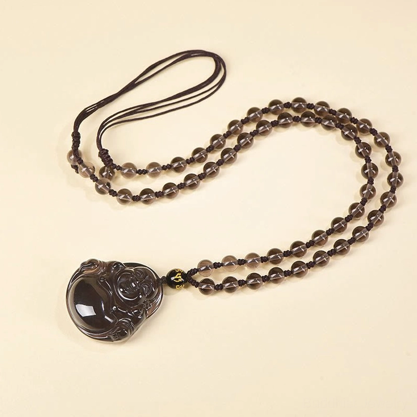 Buddha pendant linked beaded necklace with polished obsidian charm and brown bead chain
