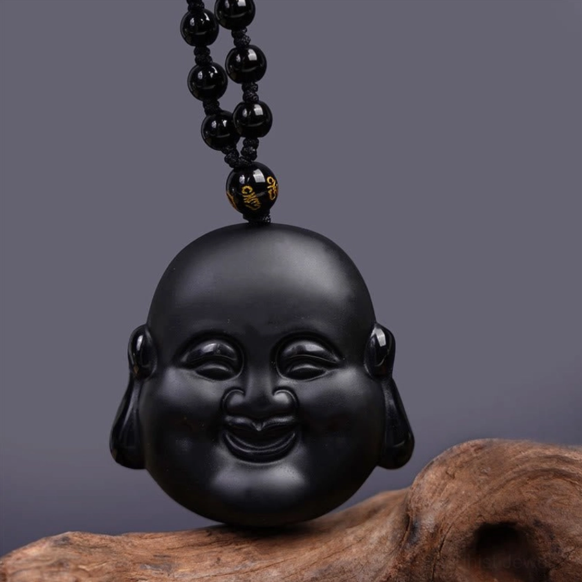 Black obsidian Buddha pendant necklace with digital caliper measuring 46.5mm length, size specification view