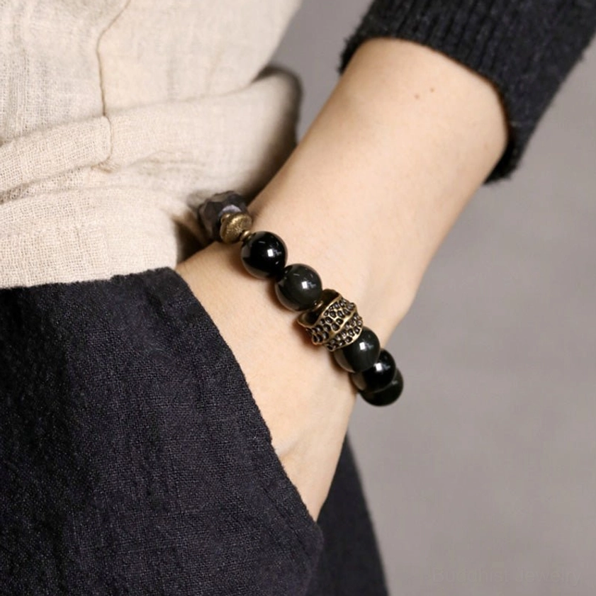 Black obsidian ebony wood copper bracelet worn on wrist - side view showing daily wear comfort and style