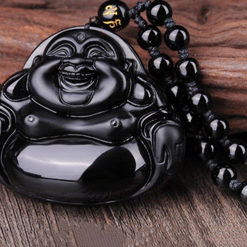Black Obsidian Buddha pendant with beaded chain three-quarter front view, featuring engraved prayer bead on necklace