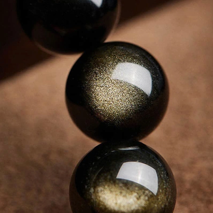 Gold sheen obsidian bracelet for meditation and spiritual healing with protective pixiu