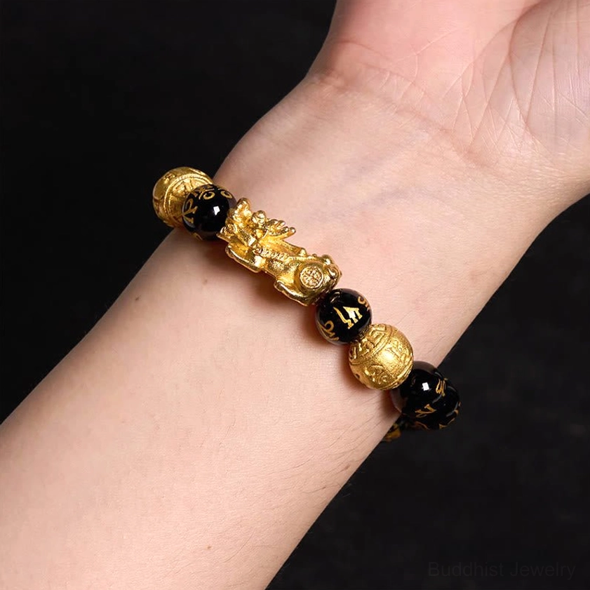 Worn Pixiu Obsidian Wealth Bracelet on left wrist showing proper fortune-attracting placement