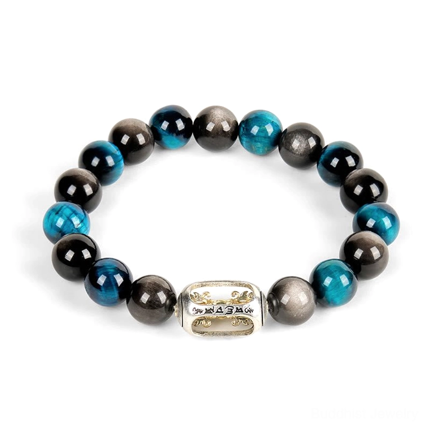 Loose gemstone Buddhist bracelet with symmetrical bead arrangement and central Om Mani Padme Hum charm on white background