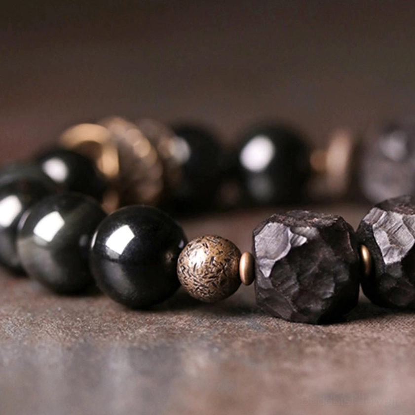 Black obsidian ebony wood copper bracelet - mixed bead detail showing smooth round obsidian, carved wood, and metal accents