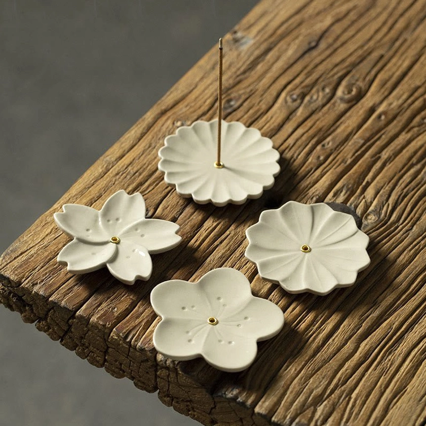 Off-white ceramic incense burner with authentic handcrafted finish and spiritual symbolism