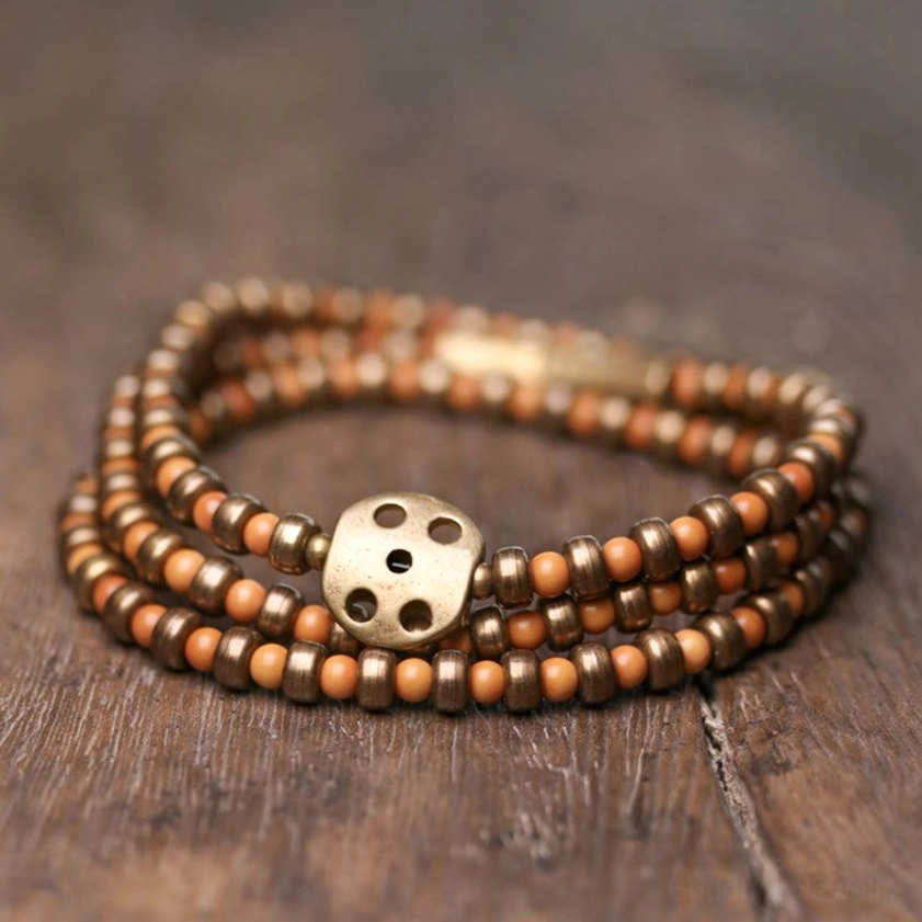 Handmade olive pit copper bracelet with antique bronze clasp for wealth and prosperity - Buddhist spiritual jewelry