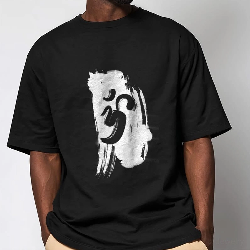 Male model wearing black Om symbol spiritual t-shirt relaxed fit on light background