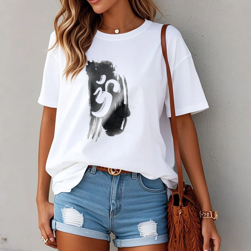 Female model wearing white Om Buddhist spiritual t-shirt with casual daily outfit