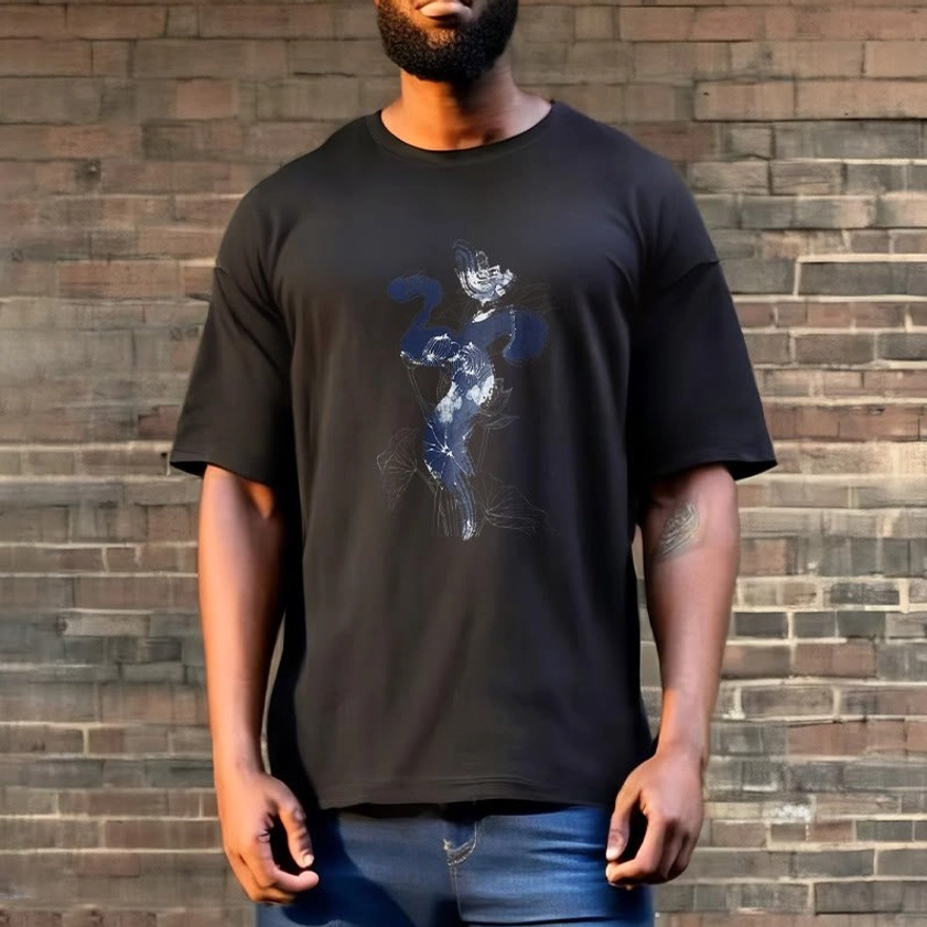 Man wearing charcoal black Om lotus Buddhist t-shirt urban brick wall background styling