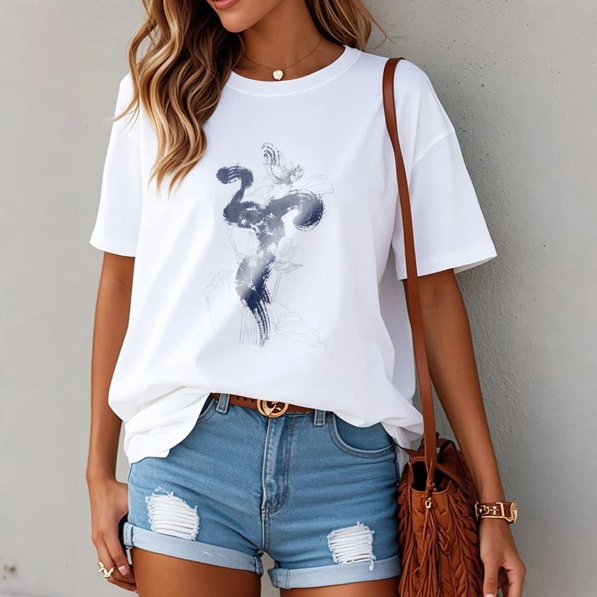 Woman wearing white Om lotus Buddhist spiritual t-shirt casual street style outdoor styling