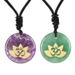 Dual crystal OM Lotus pendant necklaces - Amethyst and green aventurine healing stones with gold-stamped Buddhist symbols on black woven cord