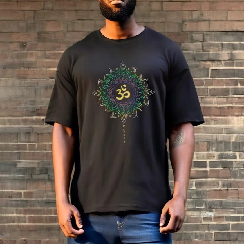 Male model styled in dark gray OM Lotus cotton t-shirt with vibrant lotus and OM chest print