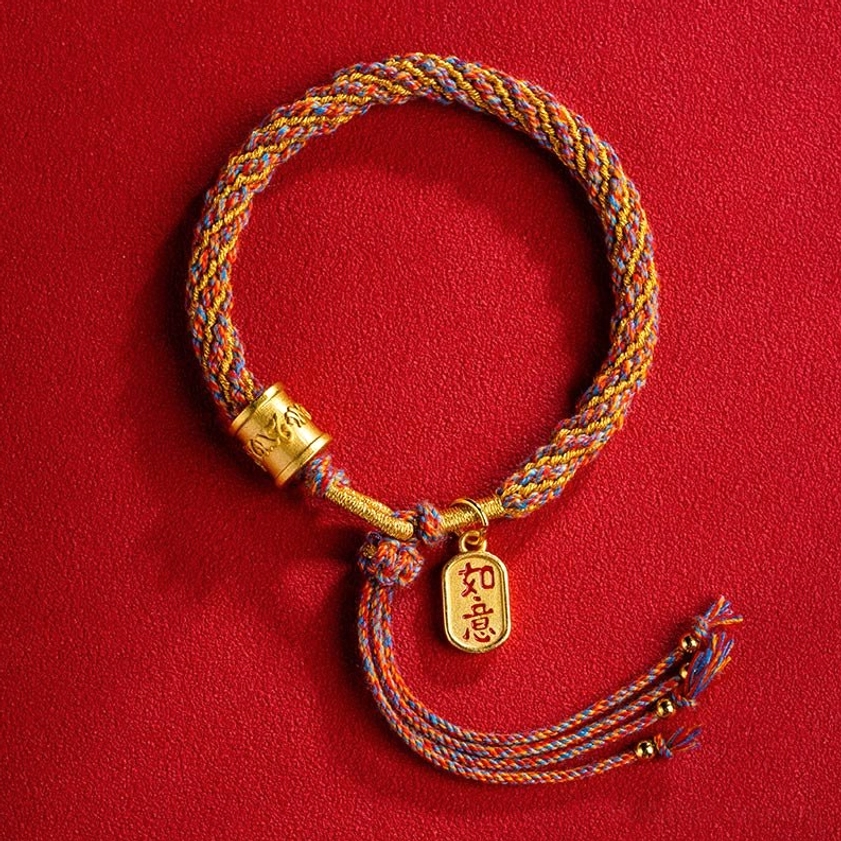 Multicolor Om Mani Padme Hum braided bracelet with red blue brown gold tones and sacred charm