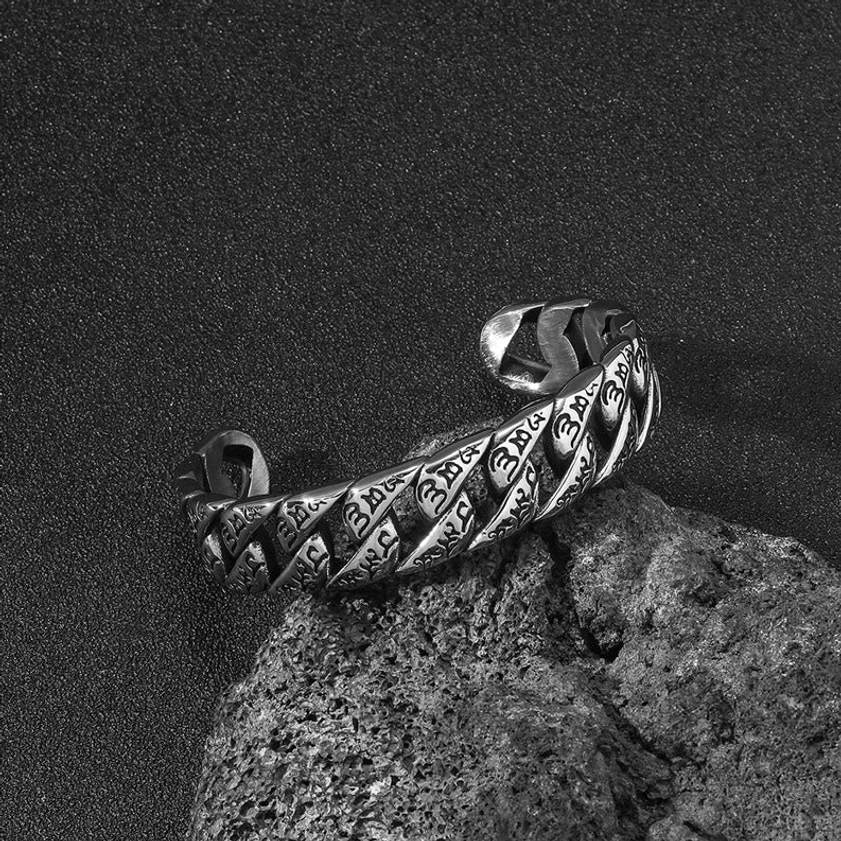 Om Mani Padme Hum mantra engraved titanium bracelet flat side view showing detailed mantra text