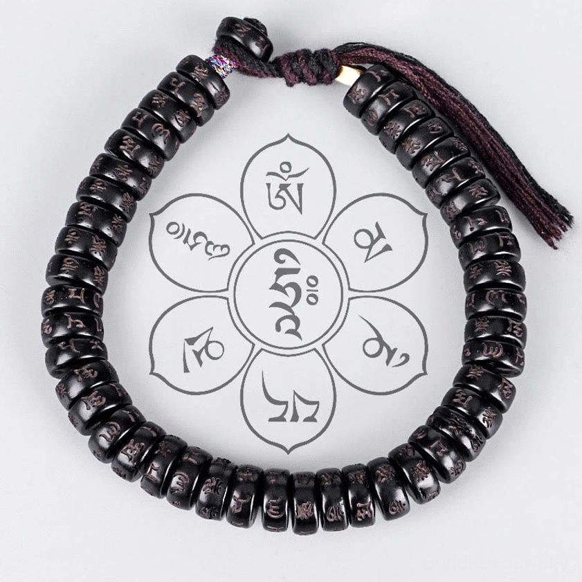 Buddhist mantra bracelet flat lay display with sacred geometry background pattern