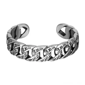 Om Mani Padme Hum titanium steel cuff bracelet with engraved six-word mantra, front view on white background