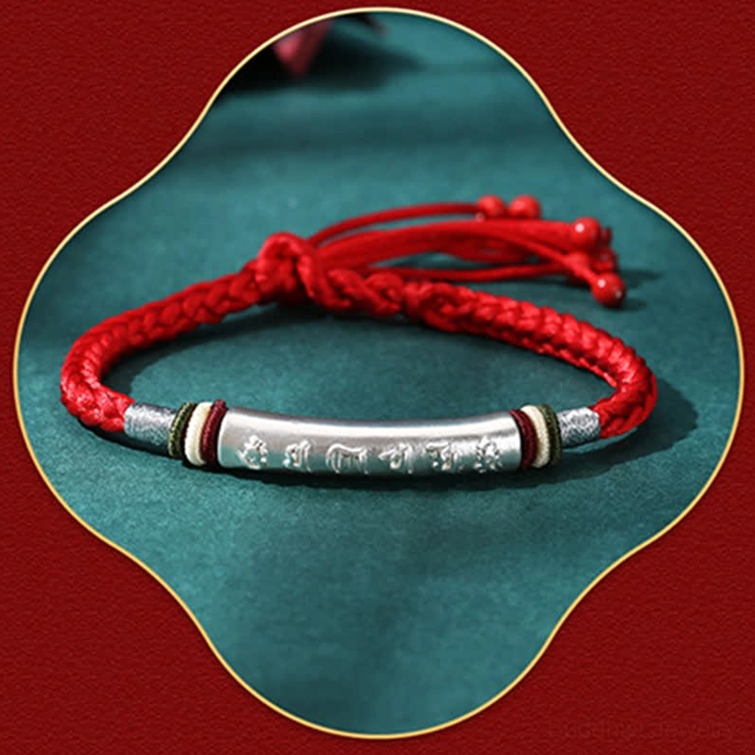 Single red Buddhist string bracelet with 999 sterling silver tube engraved with om mani padme hum sacred mantra and tassel endings