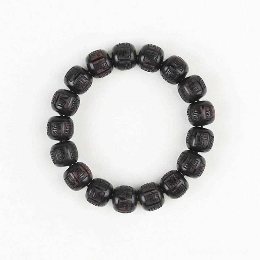 Full circular view of ebony wood mantra bracelet with Six True Words engraved on each bead against light background