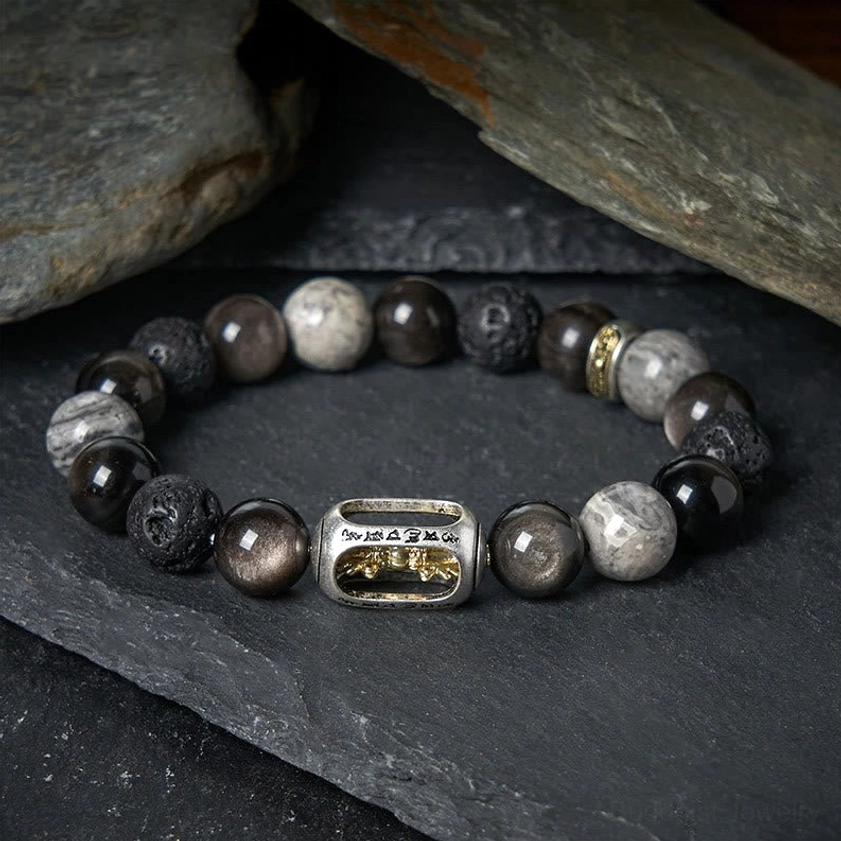 Om Mani Padme Hum mantra bracelet with silver obsidian lava rock and grey jasper beads flat lay