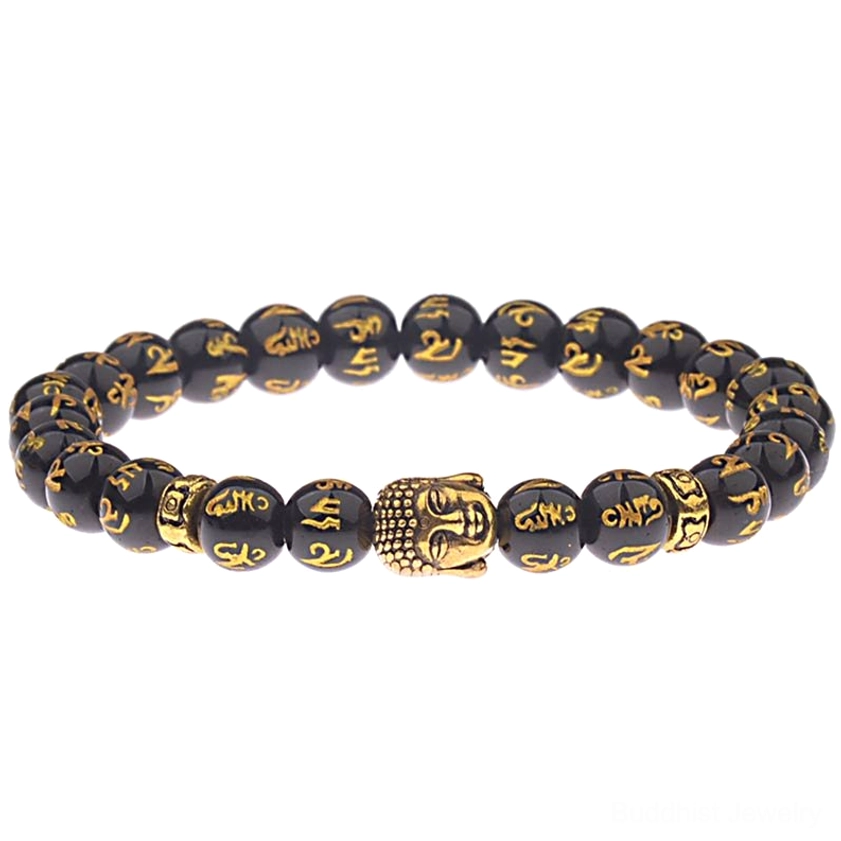 Om Mani Padme Hum black agate Buddhist bracelet with gold Sanskrit engraved beads and gold-plated Buddha head charm, studio flat lay view