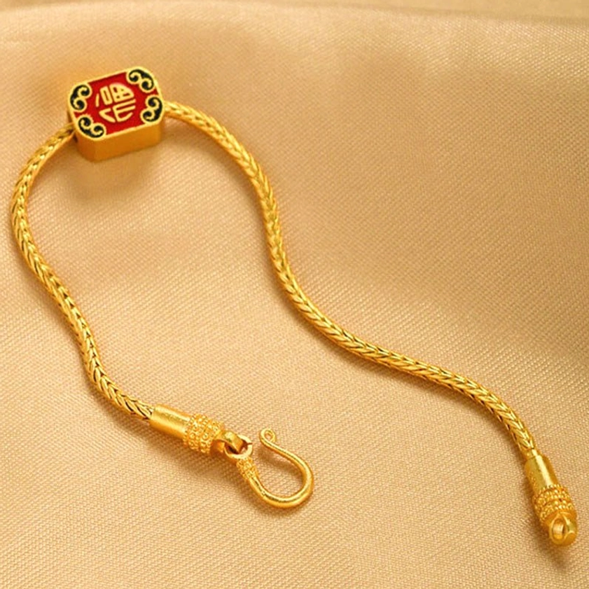 Buddhist Om Mani Padme Hum mantra bracelet detail showing sacred text engraving