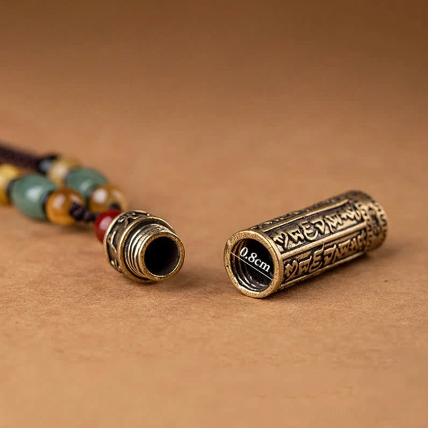 Buddhist protection necklace featuring hand-carved mantra pendant with natural agate and jade stone beads