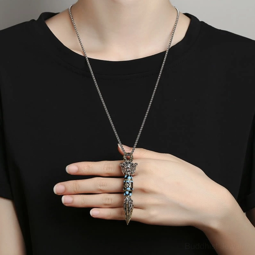 Om Mani Padme Hum Buddhist necklace worn on chest, rotatable dzi bead pendant with dorje vajra symbol, silver chain worn close to body