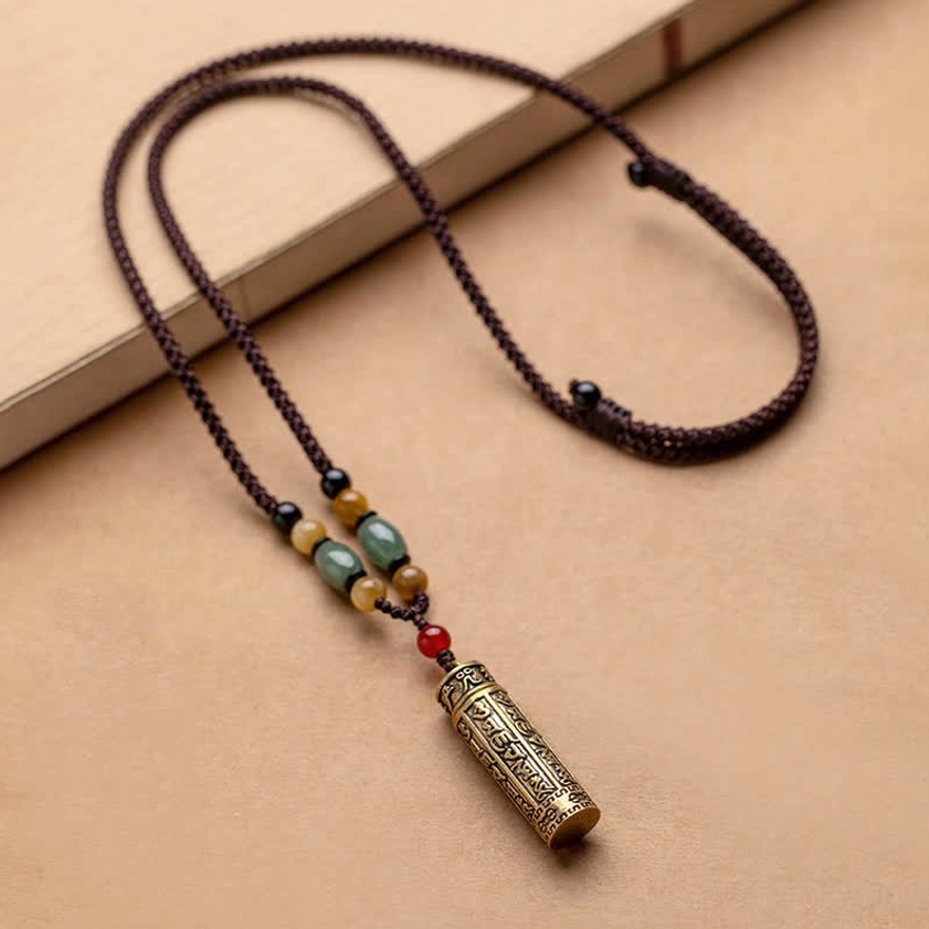 Single Om Mani Padme Hum Buddhist necklace with bronze cylinder pendant and mixed gemstone beads