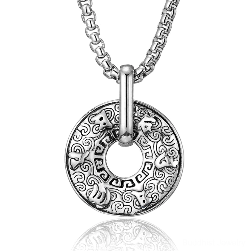 Silver Om Mani Padme Hum Buddhist donut pendant necklace positive overhead close-up showing full cloud and geometric border engravings with no gold accents on white background