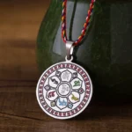 Om Mani Padme Hum Buddhist necklace pendant with colorful multicolor rope in silvery titanium steel front view