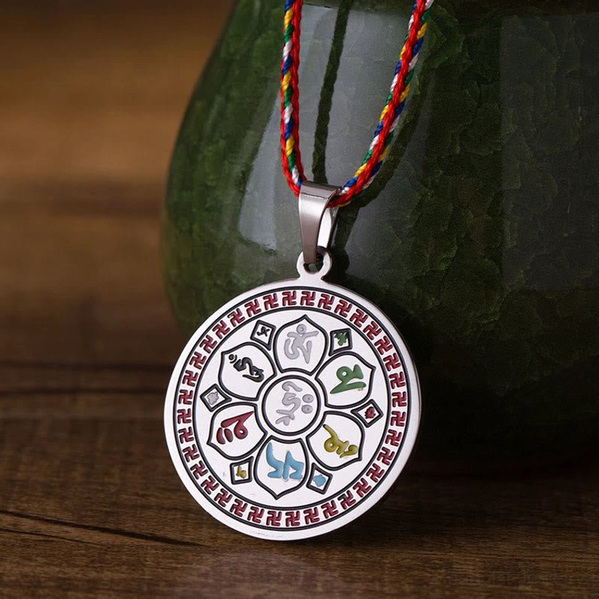 Om Mani Padme Hum Buddhist necklace pendant with colorful multicolor rope in silvery titanium steel front view