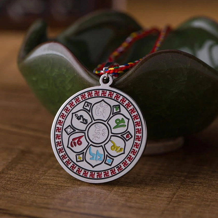 Colorful Om Mani Padme Hum titanium steel Buddhist pendant necklace angled display with ceramic holder