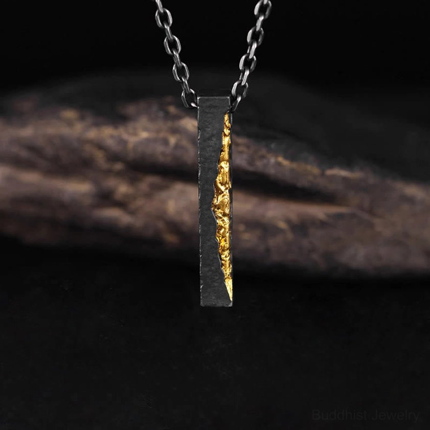 Handcrafted Om Mani Padme Hum Buddhist necklace pendant, side profile view of vertically hanging rectangular bar with mantra design