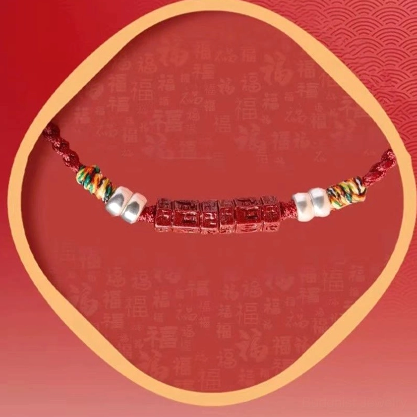 Child size Om Mani Padme Hum red string bracelet with protective cinnabar and silver beads