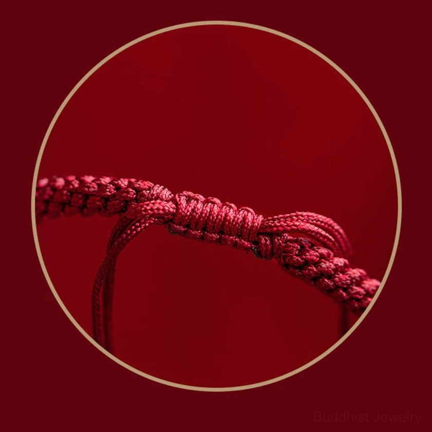 Buddhist cinnabar mantra bracelet with adjustable sizing, hand-engraved sacred Sanskrit symbols, and natural healing gemstone