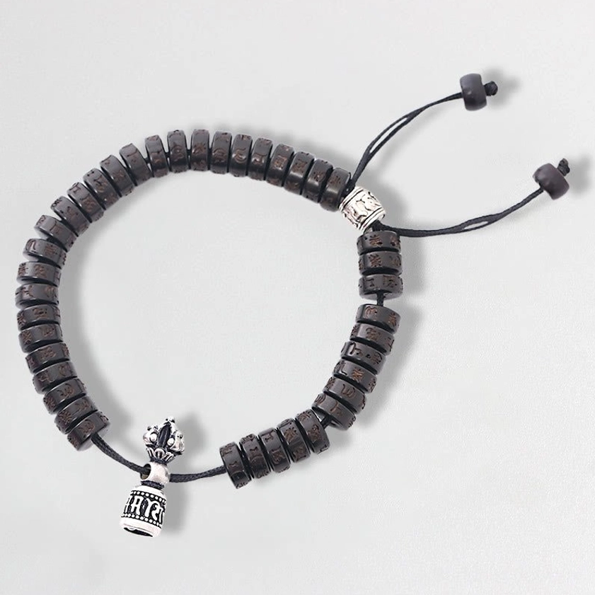 Om Mani Padme Hum coconut shell Buddhist bracelet with silver charm beads and adjustable elastic string