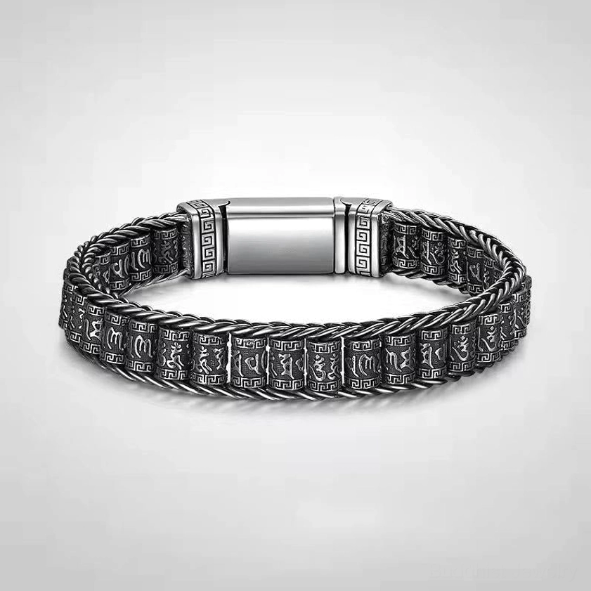 Om Mani Padme Hum copper Buddhist bracelet with engraved mantra text and magnetic buckle, front view on light background