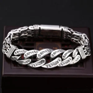 Om Mani Padme Hum engraved copper bracelet top view showing sacred mantra engravings on woven chain link design